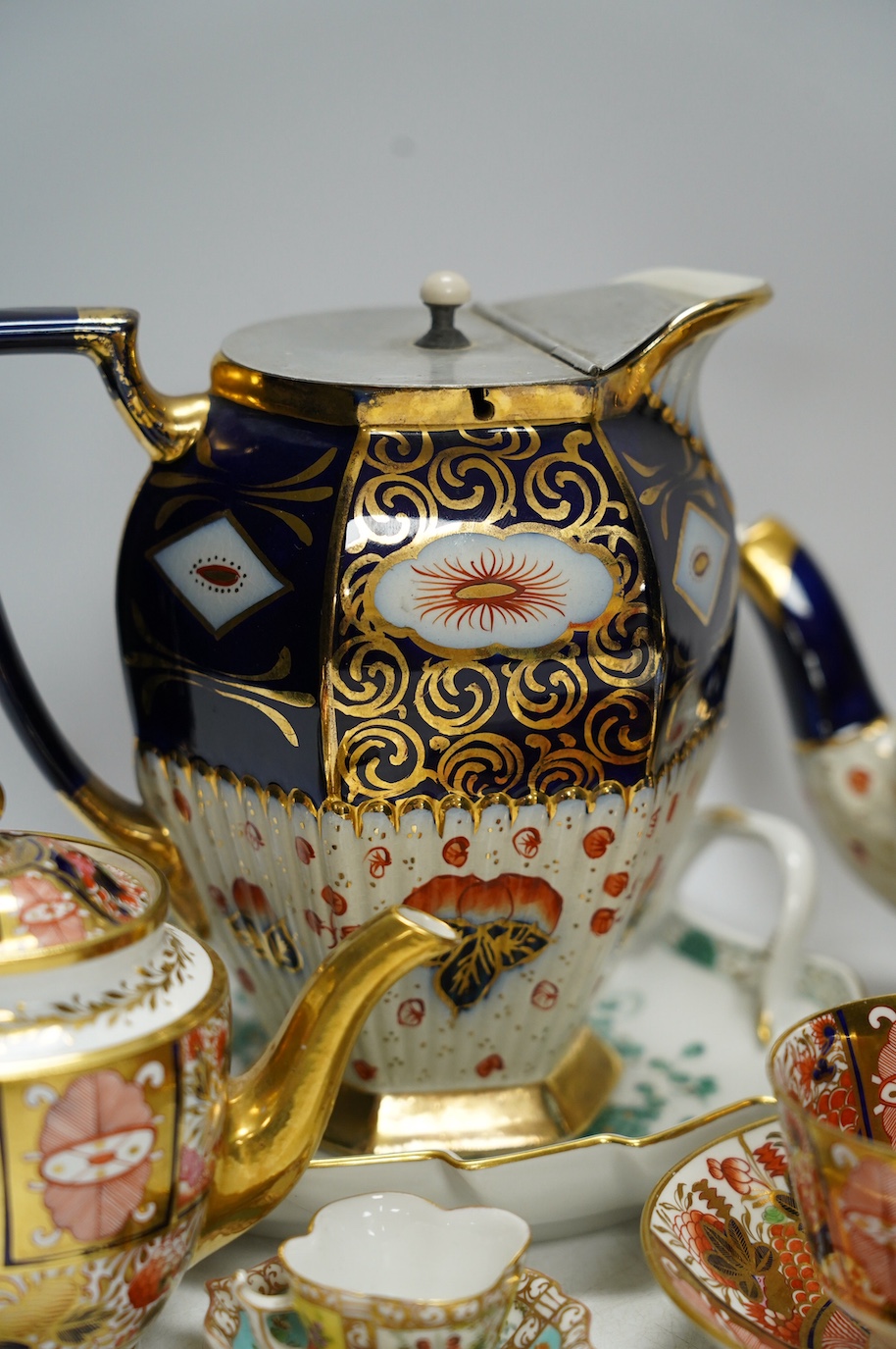 A Spode Imari pattern part teaset, collection of other porcelain tea wares and a Meissen leaf dish, largest 28cm wide. Condition - varies, mostly fair